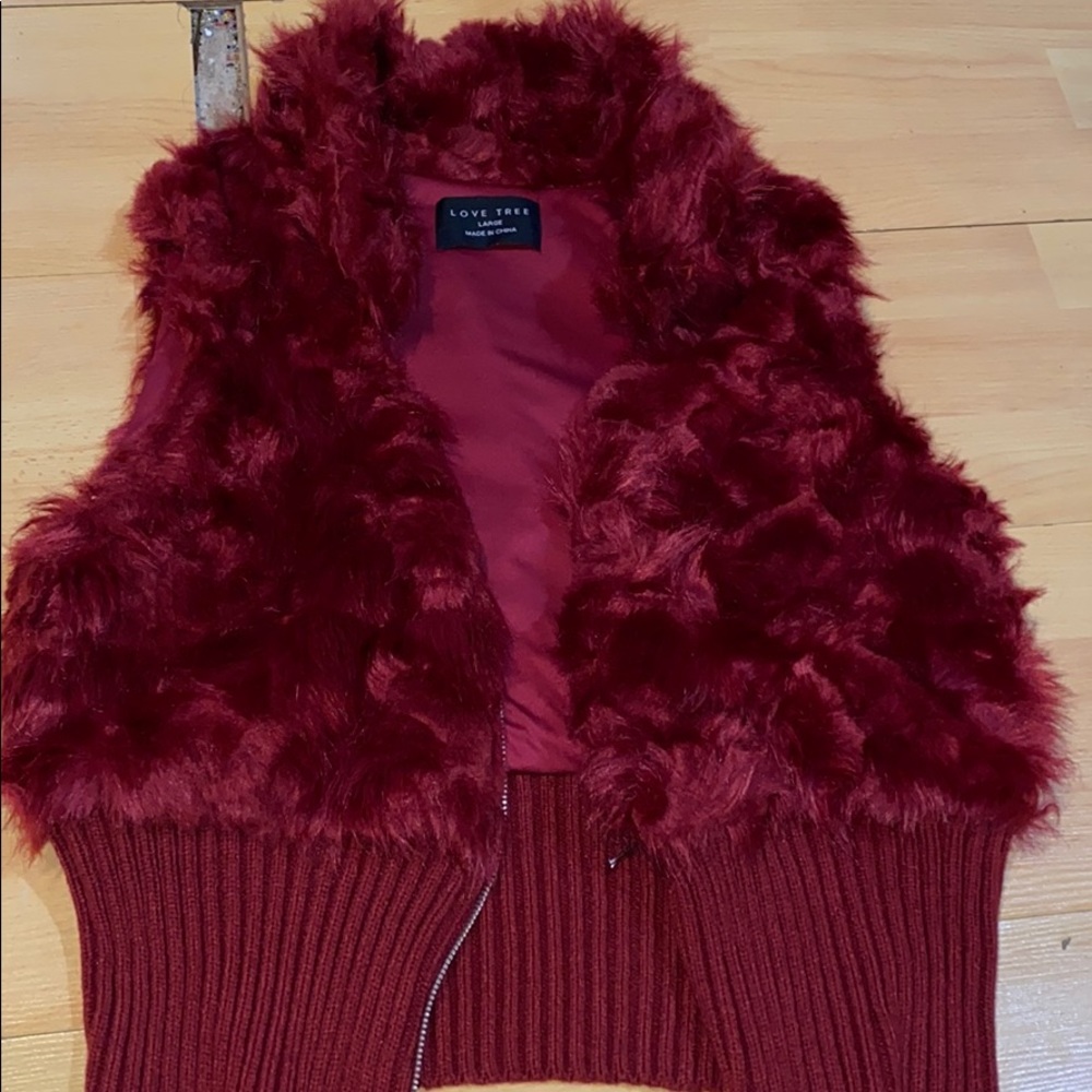 red fuzzy vest